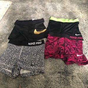 4 pair of Nike pros